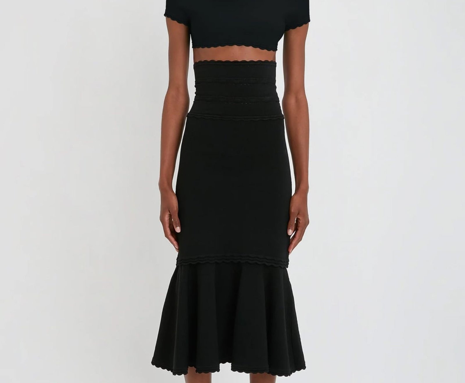 VictoriaBeckham_FlaredSkirtInBlack_BLACK_1223KSK004554A_2700_4050_247_WHITE_LR_HR_Front_Model1_JPG2_1500x